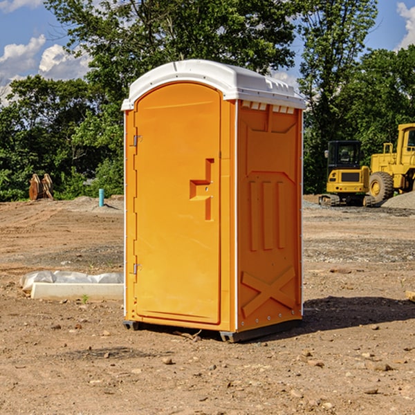 how often are the portable restrooms cleaned and serviced during a rental period in Scandia